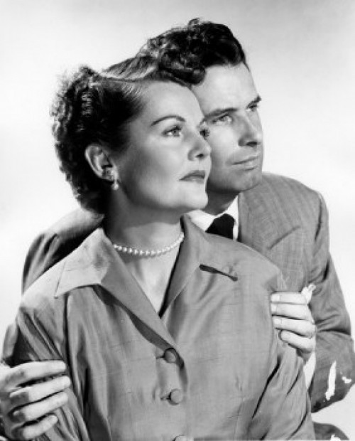 Studio portrait of mid adult couple Poster Print - Item # VARSAL25549101