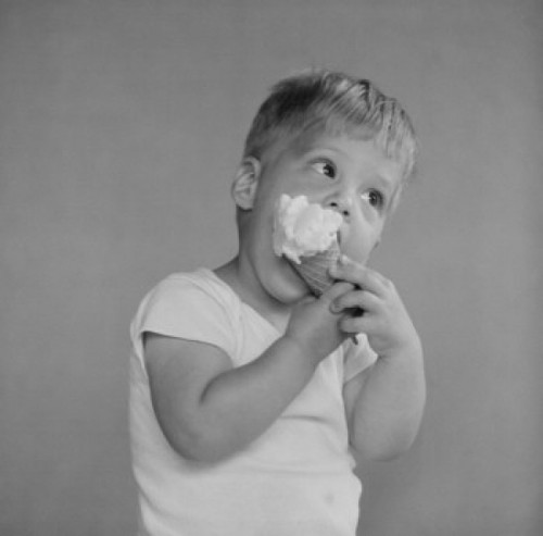 Boy eating ice cream Poster Print