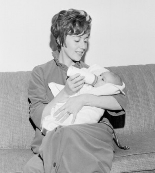 Close-up of a mother giving her infant a bottle Poster Print - Item # VARSAL2559857