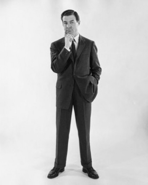 Studio portrait of businessman with hand on chin Poster Print - Item # VARSAL25548112