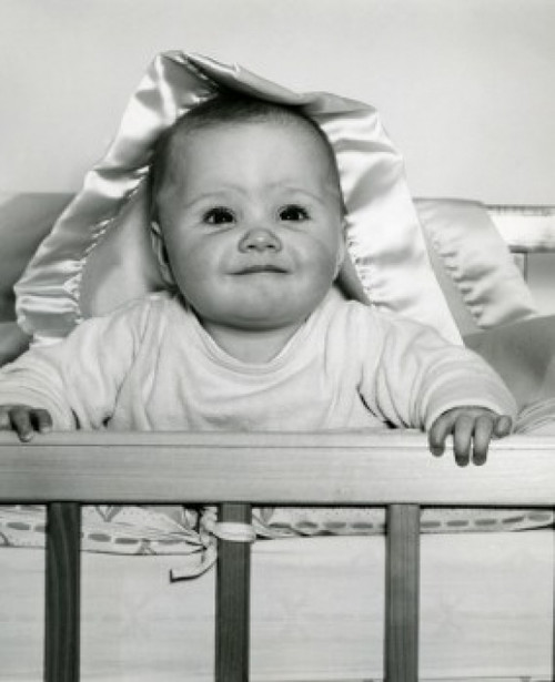 Portrait of baby in cot Poster Print - Item # VARSAL2559629