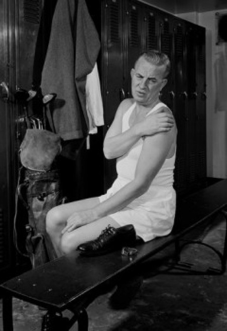 Man sitting in locker room Poster Print - Item # VARSAL255418974 Man sitting in locker room Poster Print - Item # VARSAL255418974