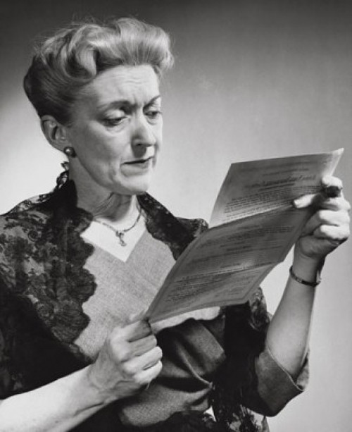 Senior woman reading a document Poster Print - Item # VARSAL2552915B