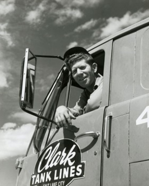 Low angle view of a truck driver sitting in a truck Poster Print - Item # VARSAL25523679