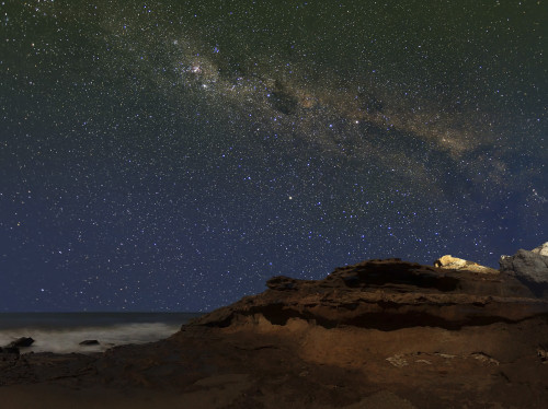 The Milky Way showing the figure known as The Emu rising over the cliffs in Miramar, Argentina Poster Print - Item # VARPSTARG100028S