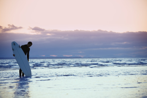 Surfer In The Shallow Water PosterPrint - Item # VARDPI1804122
