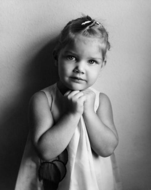 Portrait of little girl with hands under chin Poster Print - Item # VARSAL25514412A