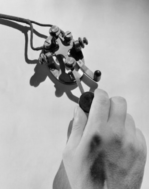 Close-up of a person's hand on a telegraph key Poster Print - Item # VARSAL25535524