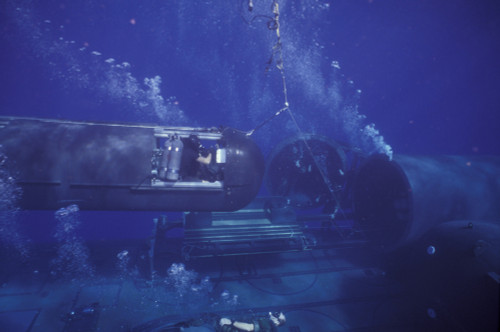 A SEAL Delivery Vehicle on tether connected to the dry deck shelter on USS Kamehameha Poster Print - Item # VARPSTWOD100152M