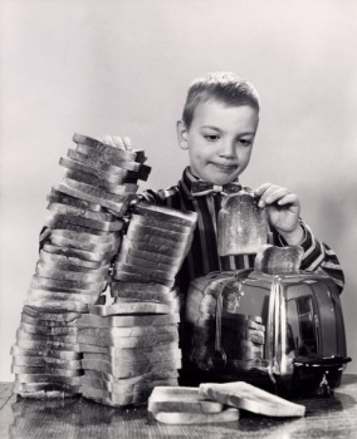 Boy making toast Poster Print - Item # VARSAL2553192