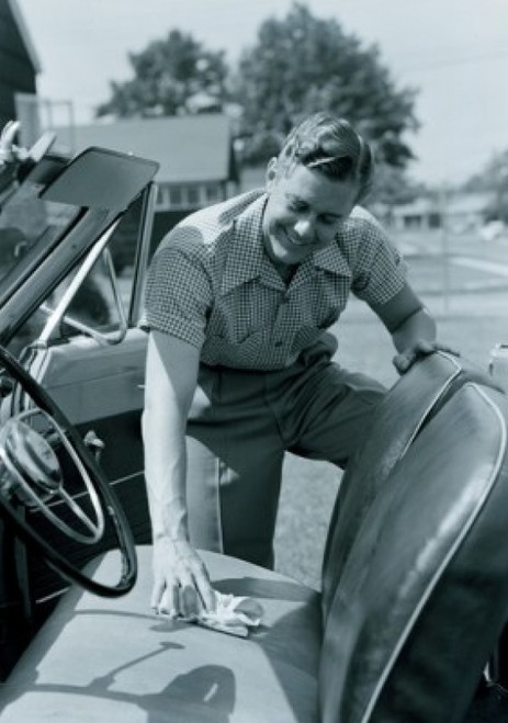 Man cleaning seat of convertible car Poster Print - Item # VARSAL255417273