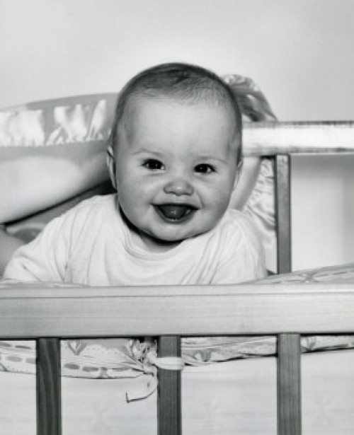 Portrait of baby in cot Poster Print - Item # VARSAL2559630