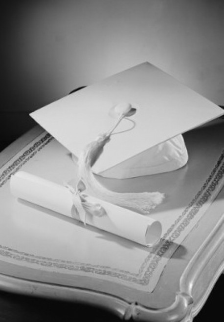 Graduation diploma and mortar board on bedside table Poster Print - Item # VARSAL255421411C