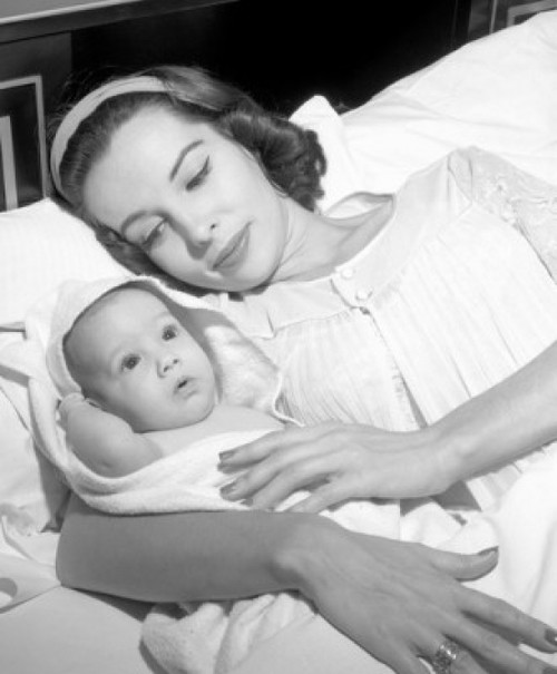 Mother with baby in bed Poster Print - Item # VARSAL2557530