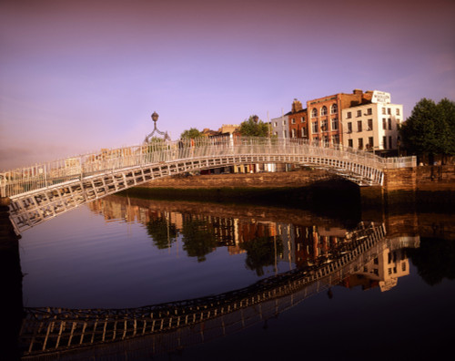 Ha'penny Bridge, River Liffey, Dublin, Ireland; Bridge Reflected In River Against Cityscape PosterPrint - Item # VARDPI1805739