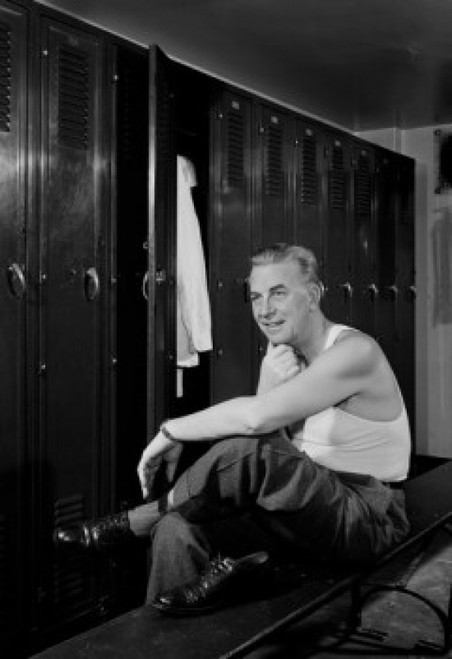 Man sitting in locker room Poster Print - Item # VARSAL255418970