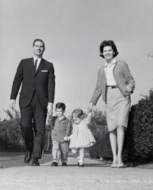 Low angle view of parents walking with children along path Poster Print - Item # VARSAL2554386B