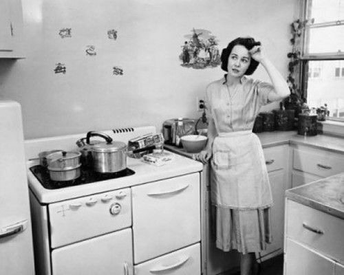 Young woman standing in the kitchen with her hand on her forehead Poster Print - Item # VARSAL2554604