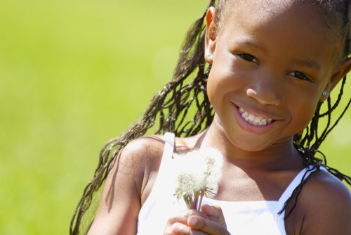 Little Girl Holding Weeds PosterPrint