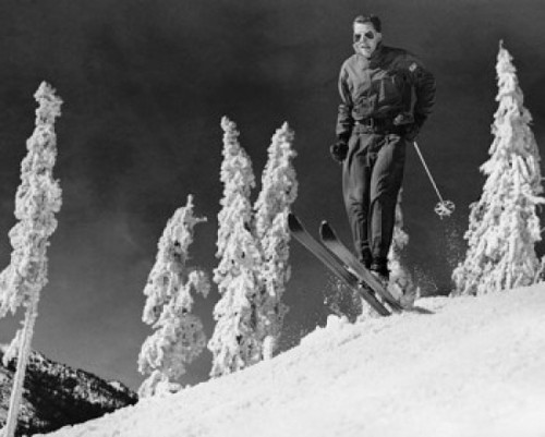 Low angle view of a mid adult man skiing on snow Poster Print - Item # VARSAL2555697