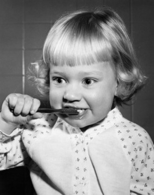 Girl brushing teeth Poster Print - Item # VARSAL2558978
