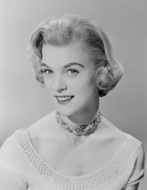 Studio portrait of young woman smiling Poster Print - Item # VARSAL255422828
