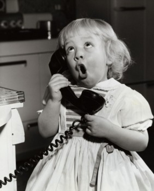 Close-up of a girl talking on the telephone Poster Print - Item # VARSAL255848