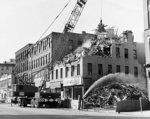 Crane demolishing a building Poster Print - Item # VARSAL25533791