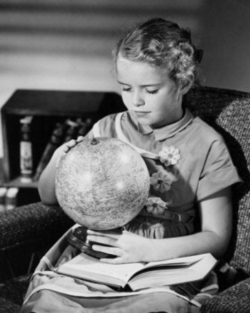 Close-up of a girl holding a globe Poster Print - Item # VARSAL2553234