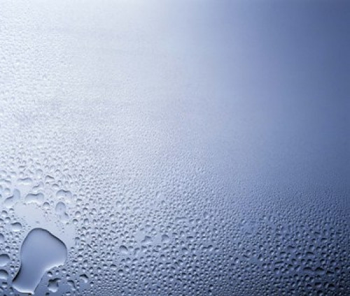 Water drops on clear glass with purple background Poster Print by Panoramic Images (24 x 21) - Item # PPI118007