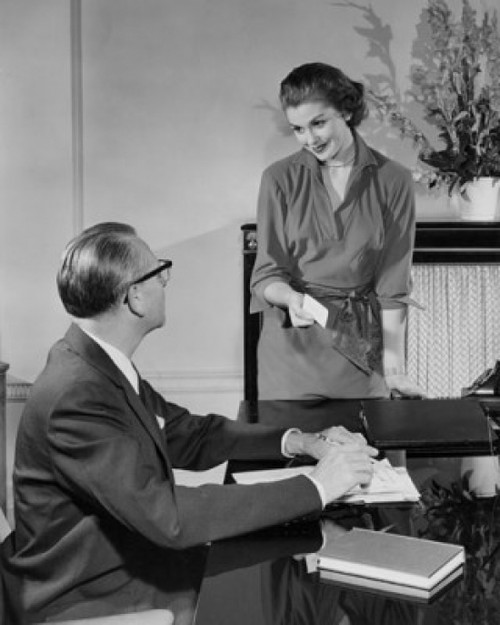 Businessman and a businesswoman talking in an office Poster Print - Item # VARSAL2555781C