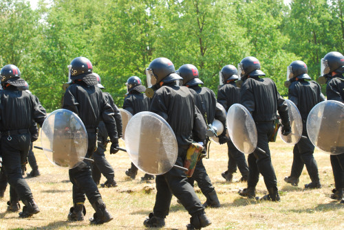Leopoldsburg, Belgium - Infantry soldiers of the Belgian Army in full riot gear during a field training exercise in riot control Poster Print - Item # VARPSTJAE100337M