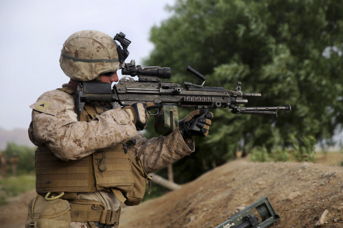 April 25, 2014 - U.S. Marine provides security with an M249 Squad Automatic Weapon during a mission in Helmand province, Afghanistan Poster Print - Item # VARPSTSTK108626M