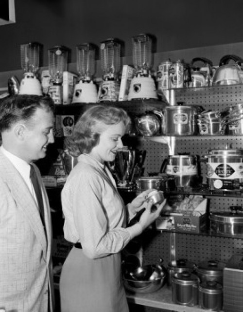 Woman in shop with kitchen utensils Poster Print - Item # VARSAL255416656