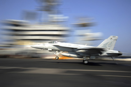 November 5, 2012 - An F/A-18E Super Hornet lands aboard the Nimitz-class aircraft carrier USS Dwight D. Eisenhower Poster Print - Item # VARPSTSTK106682M