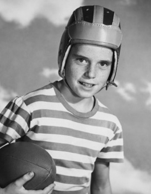 Portrait of a boy holding a football Poster Print - Item # VARSAL2553220