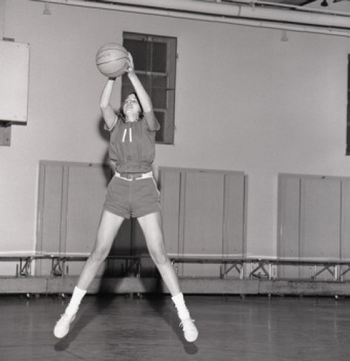 Girl jumping with basketball ball Poster Print - Item # VARSAL255418193