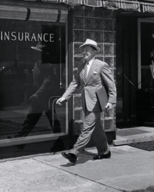 Side profile of a businessman walking with a portfolio Poster Print - Item # VARSAL25515654 Side profile of a businessman walking with a portfolio Poster Print - Item # VARSAL25515654