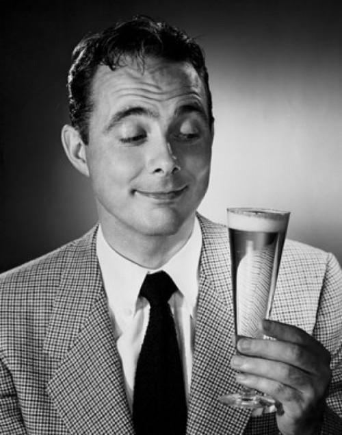 Mid adult man holding glass of beer Poster Print - Item # VARSAL2554213A