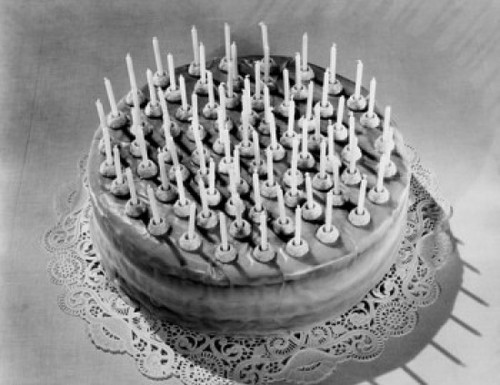 High angle view of a birthday cake decorated with candles Poster Print