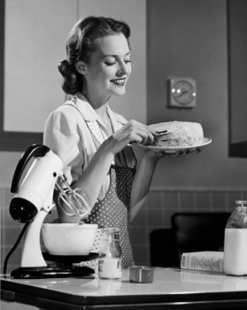 Side profile of young woman holding cake and smiling Poster Print - Item # VARSAL2552831