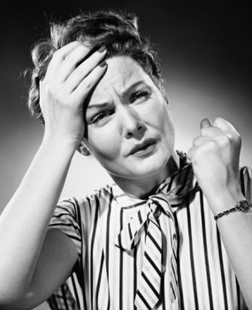 Close-up of a mid adult woman suffering from a headache Poster Print - Item # VARSAL2553723B