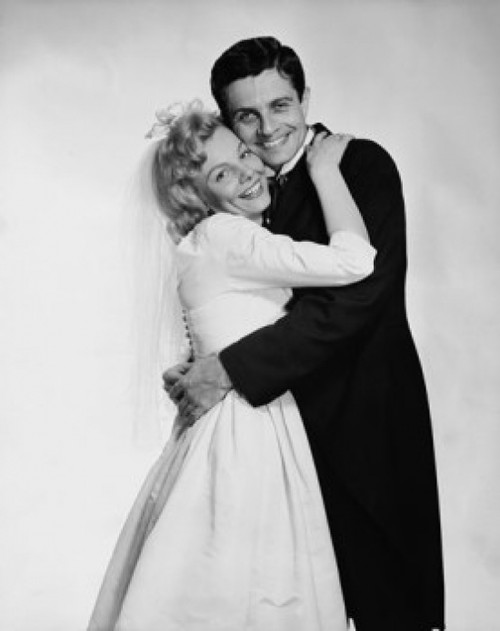 Portrait of a newlywed couple embracing Poster Print - Item # VARSAL25515073A