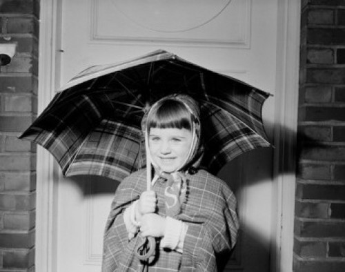 Portrait of smiling girl with umbrella Poster Print - Item # VARSAL255424664