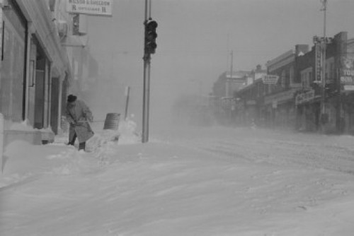 USA  Pennsylvania  Man digging snow from street Poster Print - Item # VARSAL255423400