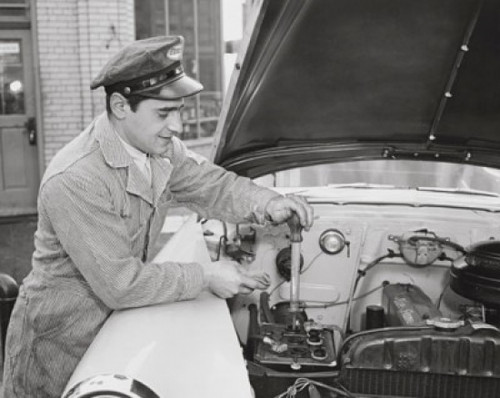 Mechanic repairing a car Poster Print - Item # VARSAL2556637A