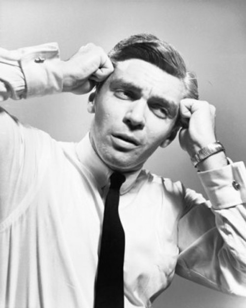 Businessman suffering from a headache Poster Print - Item # VARSAL25534743