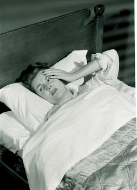 Ill woman lying in bed Poster Print - Item # VARSAL255417284