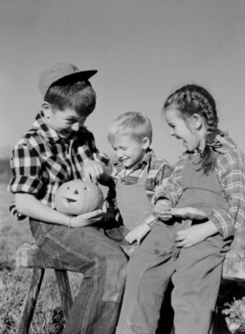 Boys and girl sitting with haloween pumpkin Poster Print - Item # VARSAL255423330