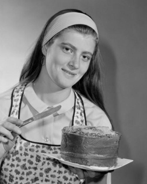 Portrait of young woman holding cake Poster Print - Item # VARSAL255422735